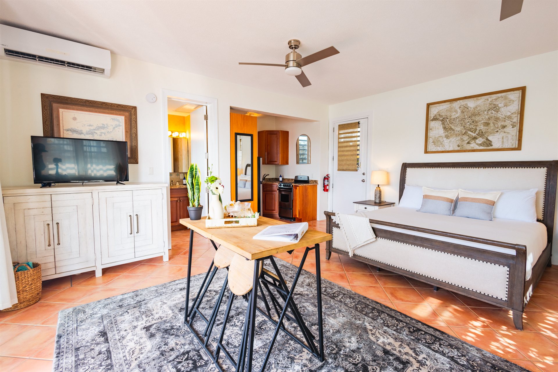 Guest king suite with upscale furnishings and private bathroom at Ocean Pointe Caribe estate